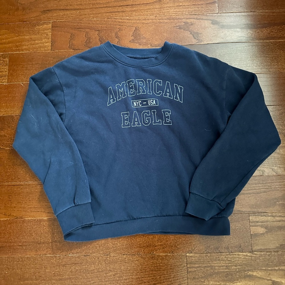 women’s blue American Eagle crew neck sweater!